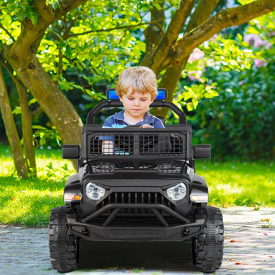 Motorized kid shops jeep